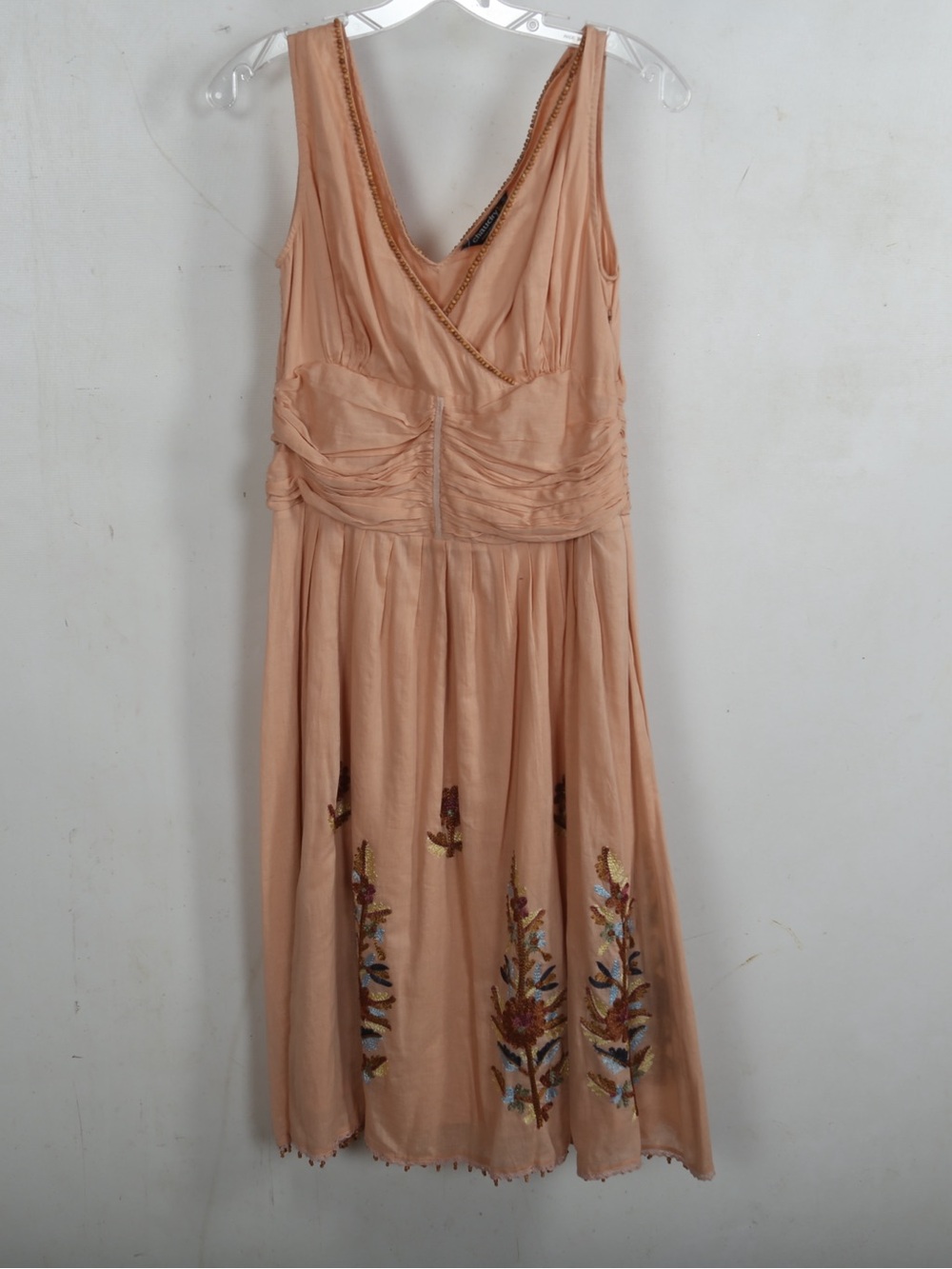 Sleeveless Peach Midi Dress with Embroidered Hem